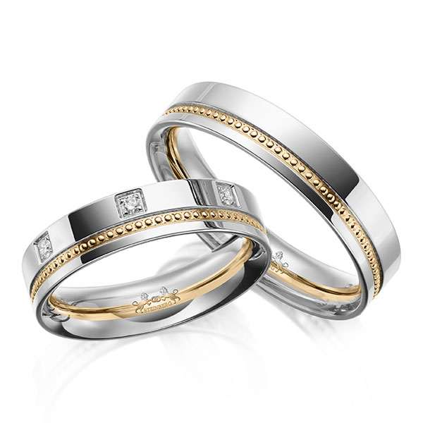 Set Bicolor trouwringen in witgoud 14 kt. roségoud 14 kt. met in totaal 0,175 ct. Briljant tw/si van Steinberg