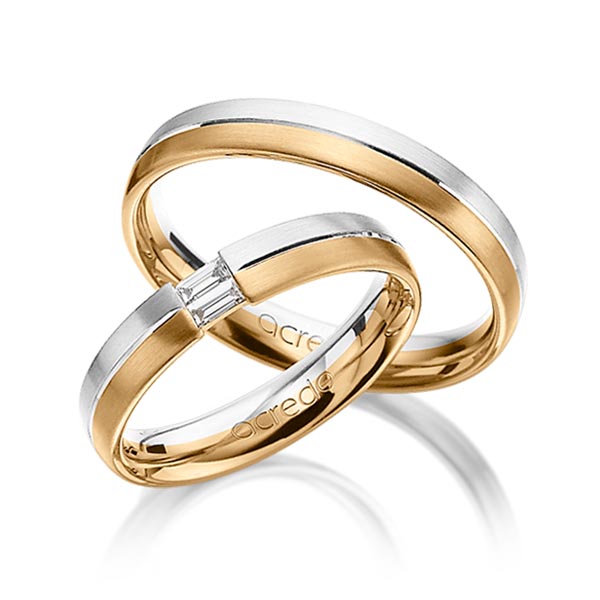 Set Bicolor trouwringen in witgoud 14 kt. roségoud 14 kt. met in totaal 0,1 ct. Baguette-Diamant tw,vs van acredo