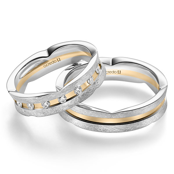 Set Bicolor trouwringen in witgoud 14 kt. roségoud 14 kt. met in totaal 0,48 ct. Briljant tw/si van acredo