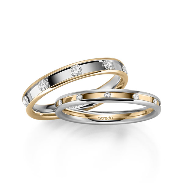 Set Bicolor trouwringen in witgoud 14 kt. roségoud 14 kt. met in totaal 0,56 ct. Briljant tw/si van acredo