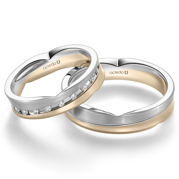 Set Bicolor trouwringen in witgoud 14 kt. Signature Goud 585 met in totaal 0,315 ct. Briljant tw/si van acredo