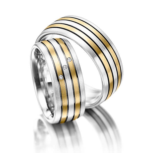 Set Bicolor trouwringen in zilver 925 geelgoud 14 kt. met in totaal 0,015 ct. Briljant tw/si van Merii