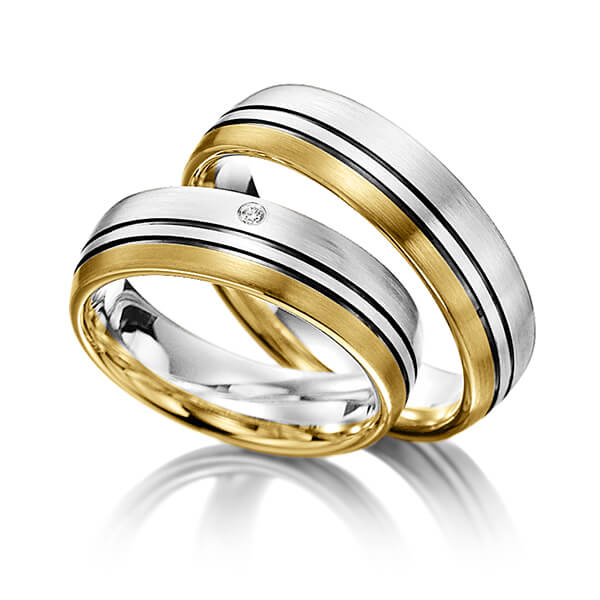 Set Bicolor trouwringen in zilver 925 geelgoud 14 kt. met in totaal 0,015 ct. Briljant tw/si van Merii