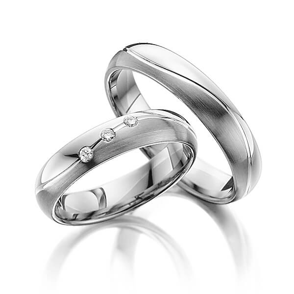 Set Bicolor trouwringen in zilver 925 palladium 14 kt. met in totaal 0,06 ct. Briljant tw/si van Steinberg