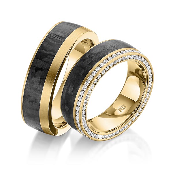 Set Carbon Memoire-trouwringen in geelgoud 14 kt. volledig gezet met in totaal 0,824 ct. Briljant tw/si van acredo