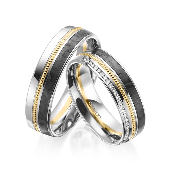 Set Carbon Memoire-trouwringen in grijsgoud 14 kt. geelgoud 14 kt. half gezet met in totaal 0,14 ct. Briljant tw/si van acredo
