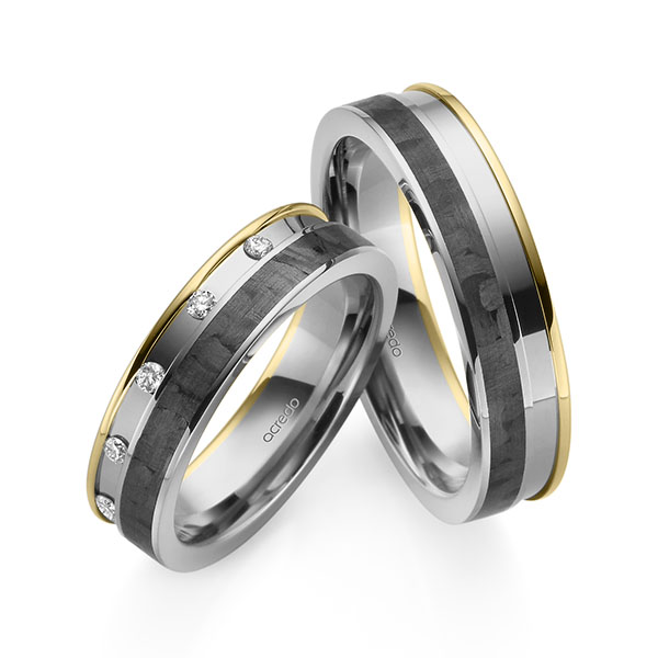 Set Carbon trouwringen in geelgoud 14 kt. grijsgoud 14 kt. grijsgoud 14 kt. met Carbon indentation met in totaal 0,1 ct. Briljant tw/si van acredo