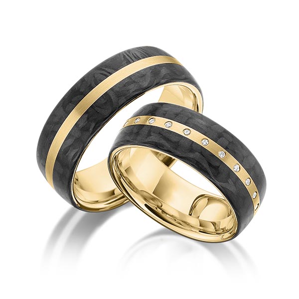 Set Carbon trouwringen in geelgoud 14 kt. met Carbon indentation met in totaal 0,065 ct. Briljant tw/si van acredo