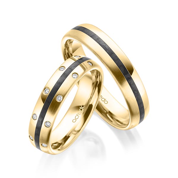 Set Carbon trouwringen in geelgoud 14 kt. met in totaal 0,096 ct. Briljant tw/si van acredo