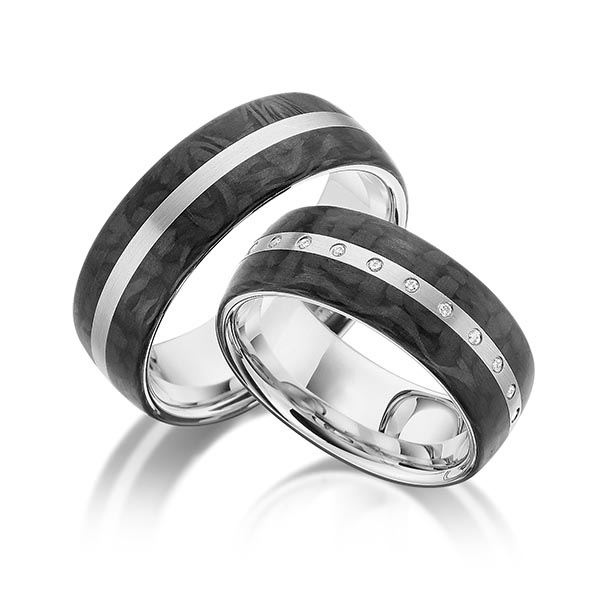 Set Carbon trouwringen in grijsgoud 14 kt. met Carbon indentation met in totaal 0,065 ct. Briljant tw/si van acredo