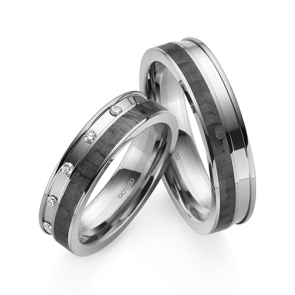 Set Carbon trouwringen in grijsgoud 14 kt. witgoud 14 kt. grijsgoud 14 kt. met Carbon indentation met in totaal 0,1 ct. Briljant tw/si van acredo