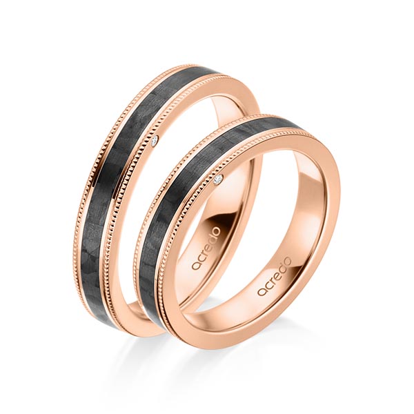 Set Carbon trouwringen in roodgoud 14 kt. met in totaal 0,01 ct. Briljant tw/si van acredo