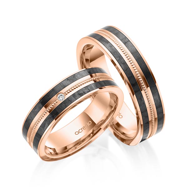 Set Carbon trouwringen in roodgoud 14 kt. met in totaal 0,02 ct. Briljant tw/si van acredo