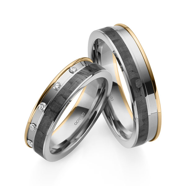 Set Carbon trouwringen in roségoud 14 kt. grijsgoud 14 kt. grijsgoud 14 kt. met Carbon indentation met in totaal 0,1 ct. Briljant tw/si van acredo