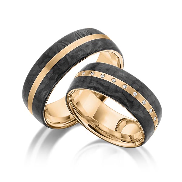 Set Carbon trouwringen in roségoud 14 kt. met Carbon indentation met in totaal 0,065 ct. Briljant tw/si van acredo
