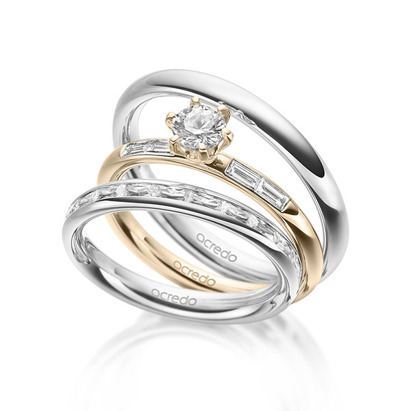 Set in buiten witgoud 14 kt. , binnen witgoud 14 kt. half gezet met 0,5 ct. + in totaal 0,75 ct. Baguette-Diamant & Briljant tw,vs tw/si van acredo