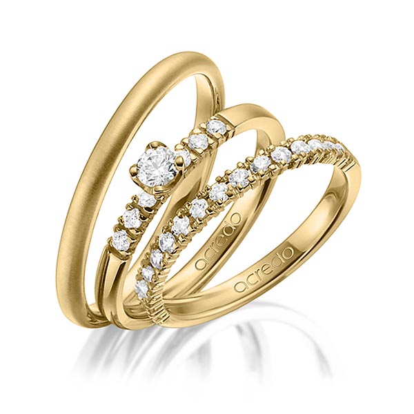 Set in geelgoud 14 kt. half gezet met in totaal 0,59 ct. Briljant & Briljanten tw/si van acredo