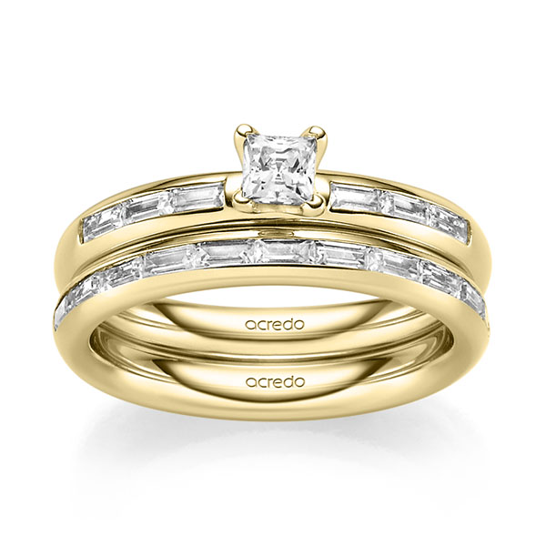 Set in geelgoud 14 kt. met 0,3 ct. + in totaal 0,85 ct. Briljant & Baguette-Diamant tw,vs van acredo