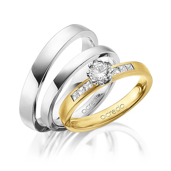 Set in geelgoud 14 kt. met 0,4 ct. + in totaal 0,18 ct. Princess-Diamant & Briljant tw/si tw,vs van acredo