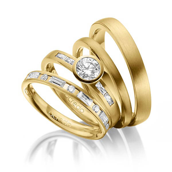 Set in geelgoud 14 kt. met 0,5 ct. + in totaal 1,005 ct. Baguette-Diamant & Briljant & Briljanten tw,vs tw/si van acredo