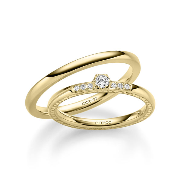 Set in geelgoud 14 kt. met in totaal 0,148 ct. Briljanten tw/si van acredo