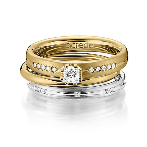 Set in geelgoud 14 kt. met in totaal 0,47 ct. Princess-Diamant & Briljant tw/si van acredo