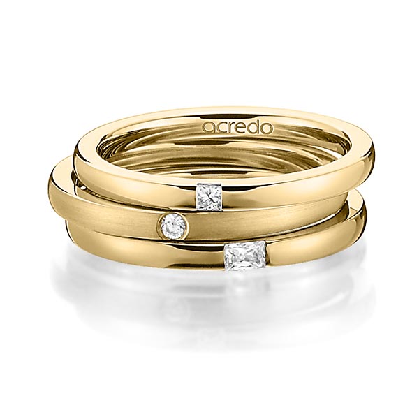Set in geelgoud 18 kt. met in totaal 0,125 ct. Princess-Diamant & Briljant & Baguette-Diamant tw/si tw,vs van acredo