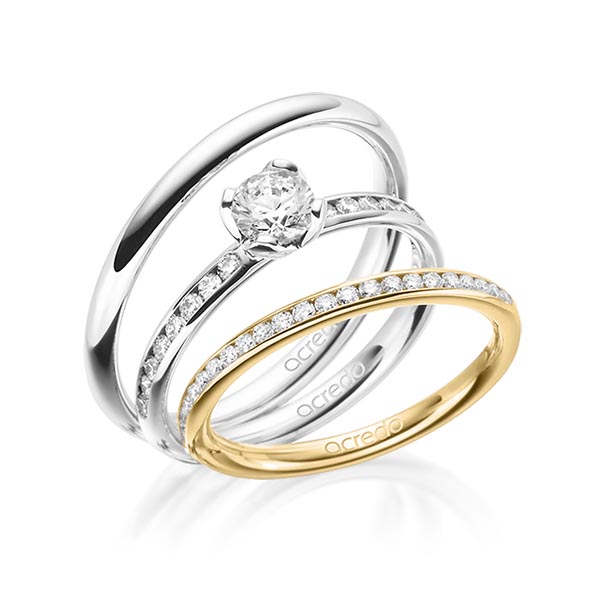 Set in Gelbgold 585 halbausgefasst mit 0,5 ct. + zus. 0,55 ct. Brillant tw, si tw, vs von acredo