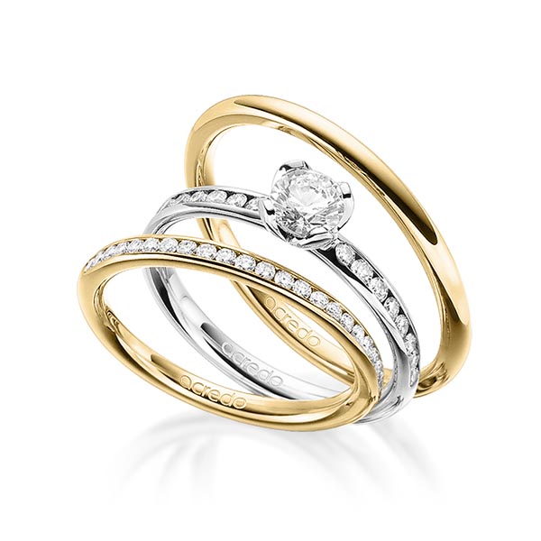 Set in Gelbgold 585 halbausgefasst mit 0,5 ct. + zus. 0,55 ct. Brillant tw, si tw, vs von acredo