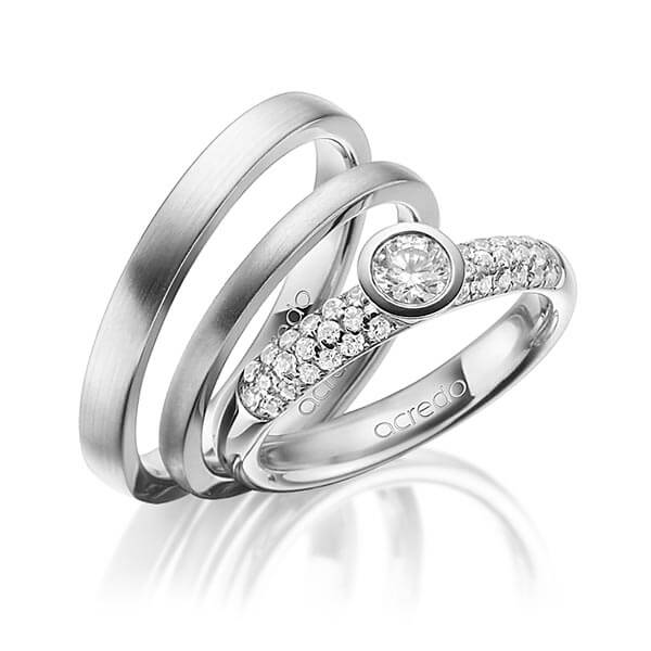 Set in Graugold 585 mit zus. 0,61 ct. Brillant tw, vs tw, si von acredo