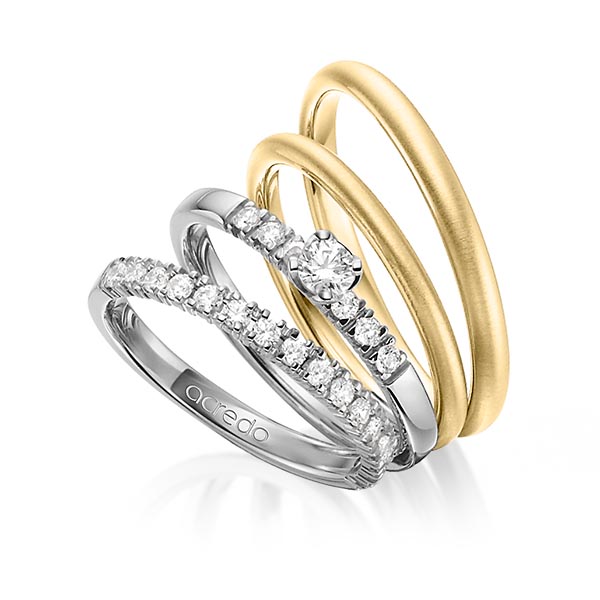 Set in grijsgoud 14 kt. half gezet met in totaal 0,59 ct. Briljant & Briljanten tw/si van acredo