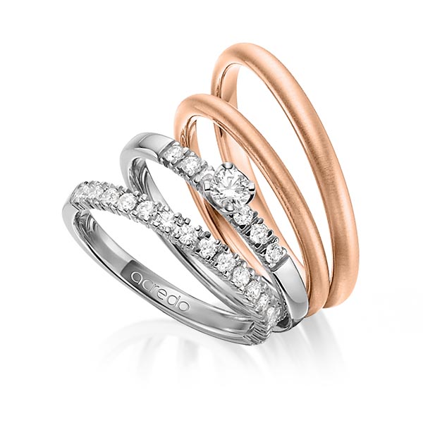 Set in grijsgoud 14 kt. half gezet met in totaal 0,59 ct. Briljant & Briljanten tw/si van acredo