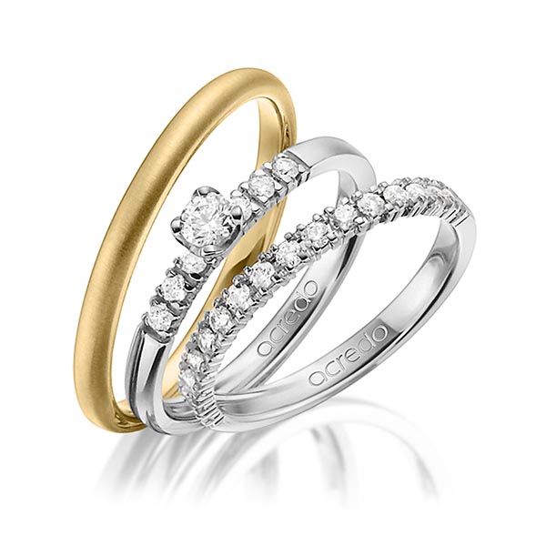 Set in grijsgoud 14 kt. half gezet met in totaal 0,59 ct. Briljant & Briljanten tw/si van acredo