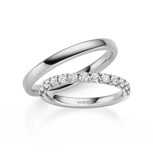 Set in grijsgoud 14 kt. half gezet met in totaal 0,65 ct. Briljant tw/si van acredo