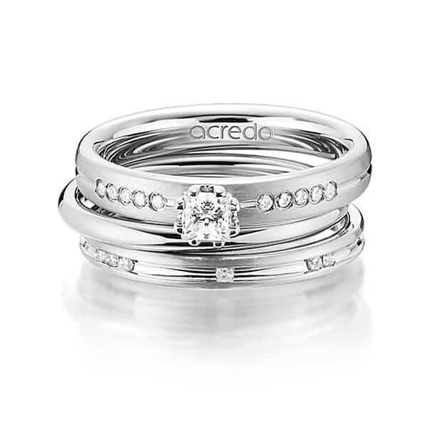 Set in grijsgoud 14 kt. met in totaal 0,47 ct. Princess-Diamant & Briljant tw/si van acredo