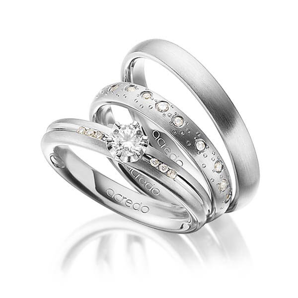 Set in grijsgoud 14 kt. met in totaal 0,519 ct. Briljant & Briljanten tw/si van acredo