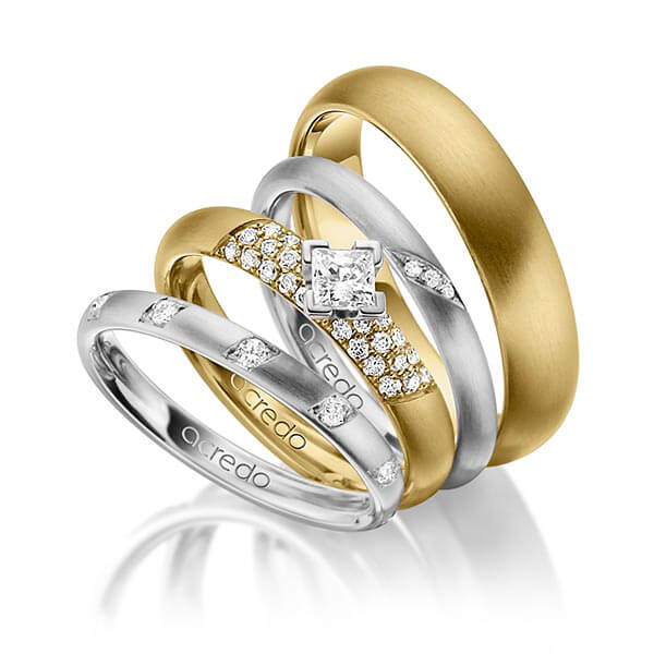 Set in grijsgoud 14 kt. met in totaal 0,755 ct. Briljant & Princess-Diamant tw/si van acredo