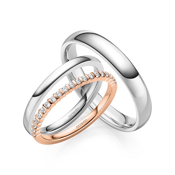 Set in roodgoud 14 kt. half gezet met in totaal 0,2 ct. Briljant tw,vs van acredo