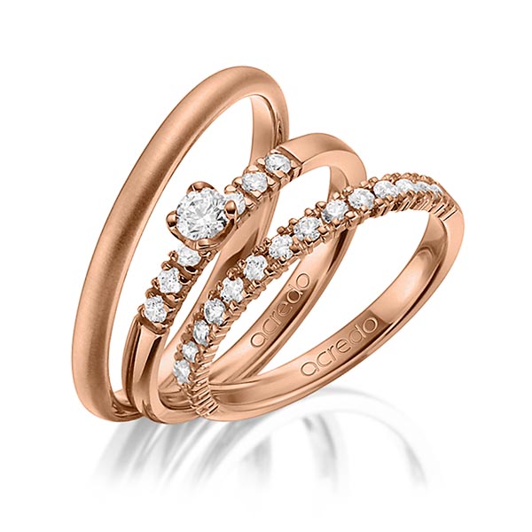 Set in roodgoud 14 kt. half gezet met in totaal 0,59 ct. Briljant & Briljanten tw/si van acredo