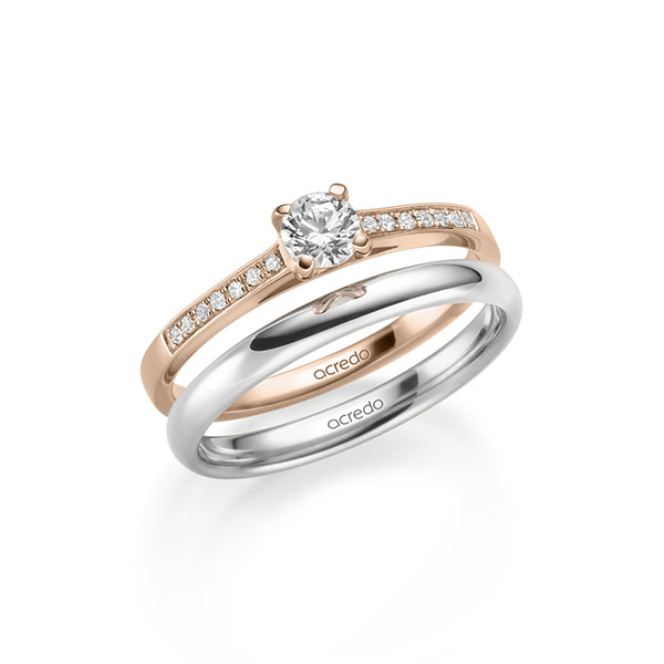 Set in roodgoud 14 kt. met 0,3 ct. + in totaal 0,07 ct. Briljant tw/si van acredo Set in roodgoud 14 kt. met 0,3 ct. + in totaal 0,07 ct. Briljant tw/si van acredo