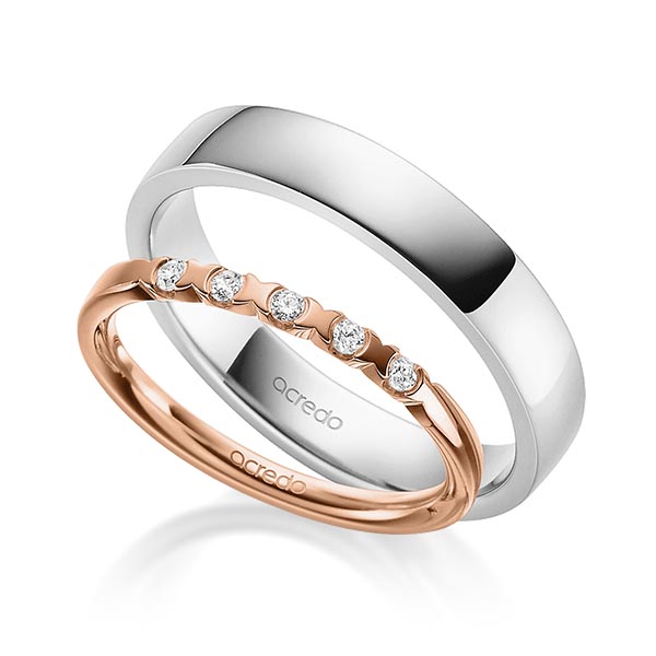 Set in roodgoud 14 kt. met in totaal 0,1 ct. Briljant tw,vs van acredo