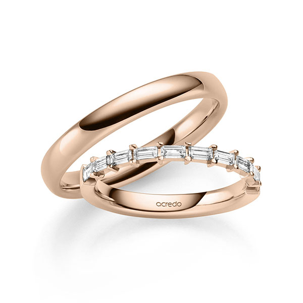 Set in roodgoud 14 kt. met in totaal 0,5 ct. tw,vs van acredo