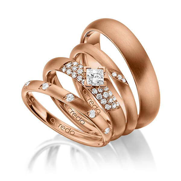 Set in roodgoud 14 kt. met in totaal 0,755 ct. Briljant & Princess-Diamant tw/si van acredo