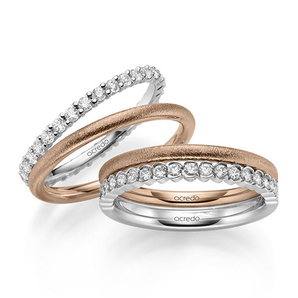 Set in roodgoud 14 kt. met in totaal 1 ct. Briljant tw/si van acredo