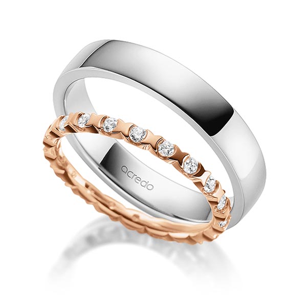 Set in roodgoud 14 kt. volledig gezet met in totaal 0,4 ct. Briljant tw,vs van acredo