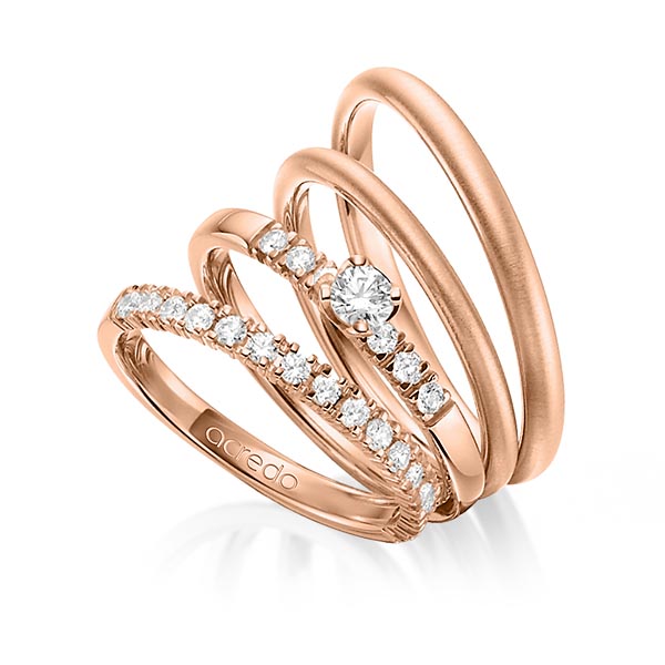Set in roodgoud 18 kt. half gezet met in totaal 0,64 ct. Briljant & Briljanten tw/si van acredo