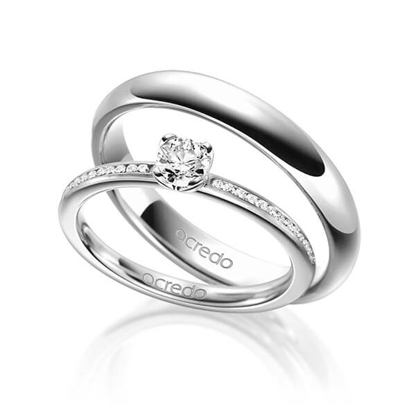 Set in witgoud 14 kt. met 0,3 ct. + in totaal 0,13 ct. Briljanten tw/si van acredo