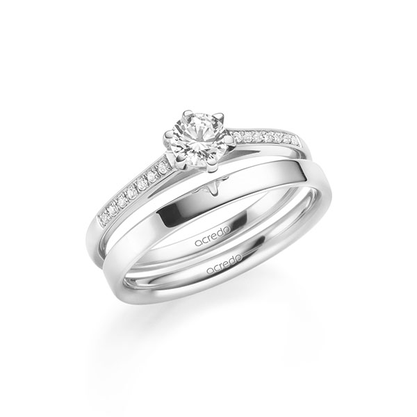 Set in witgoud 14 kt. met 0,4 ct. + in totaal 0,07 ct. Briljant tw/si van acredo Set in witgoud 14 kt. met 0,4 ct. + in totaal 0,07 ct. Briljant tw/si van acredo