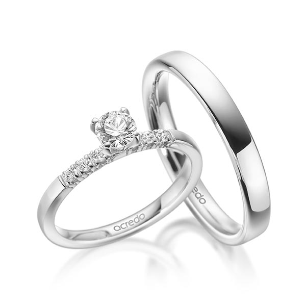Set in witgoud 14 kt. met 0,4 ct. + in totaal 0,12 ct. Briljant tw/si van acredo - A-1926-1 Set in witgoud 14 kt. met 0,4 ct. + in totaal 0,12 ct. Briljant tw/si van acredo - A-1926-1