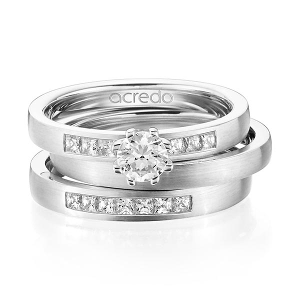 Set in witgoud 14 kt. met 0,4 ct. + in totaal 0,39 ct. Briljant & Princess-Diamant tw,vs tw/si van acredo